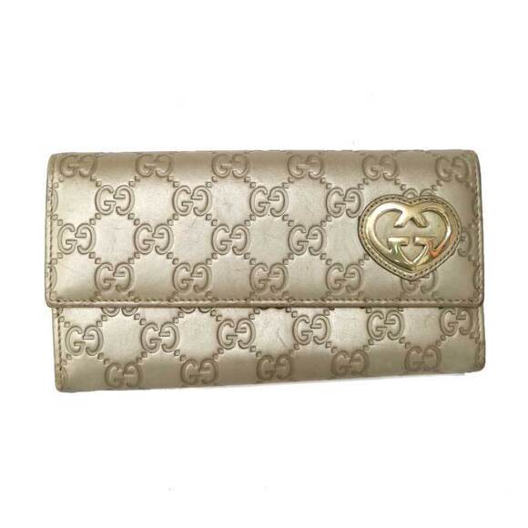 Gucci Handbags - Gucci Bi fold Wallet GG Gucci Guccissima Line Leather Gold